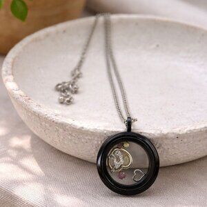 Locket Style Necklace With Black Frame & Charms Inside